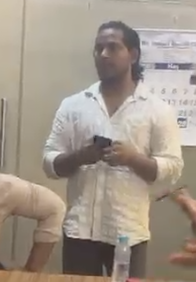 Man customers identify as Dilshad Pathan standing in the reported Future Wings International office