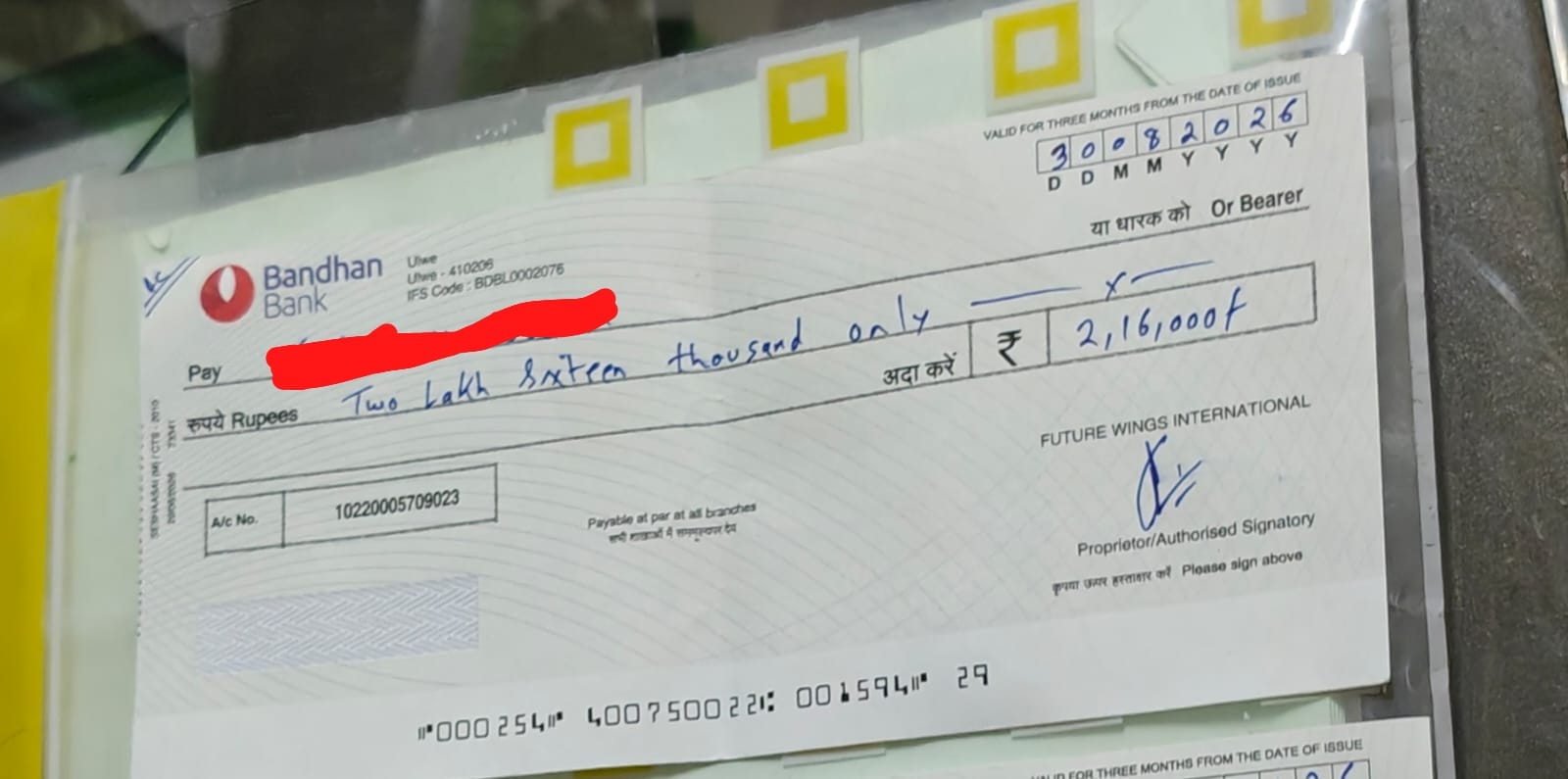 Post-dated cheque for 2 lakh 16 thousand rupees drawn on Future Wings International at Bandhan Bank Ulwe
